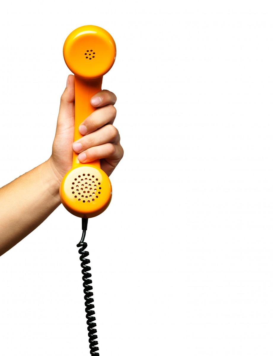 Pestcheck pest control phone number with an orange vintage phone