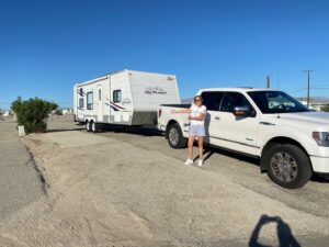 Julie with her RV wondering how mice get in your rv